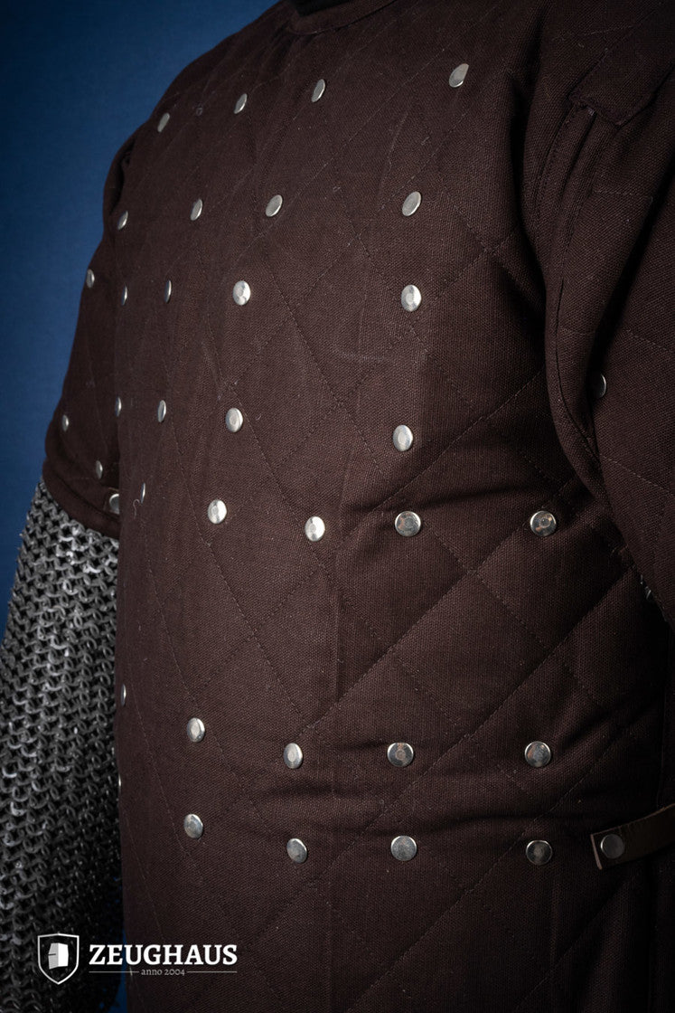 Brown Brigantine armor with studded detailing and leather straps, designed for warriors.