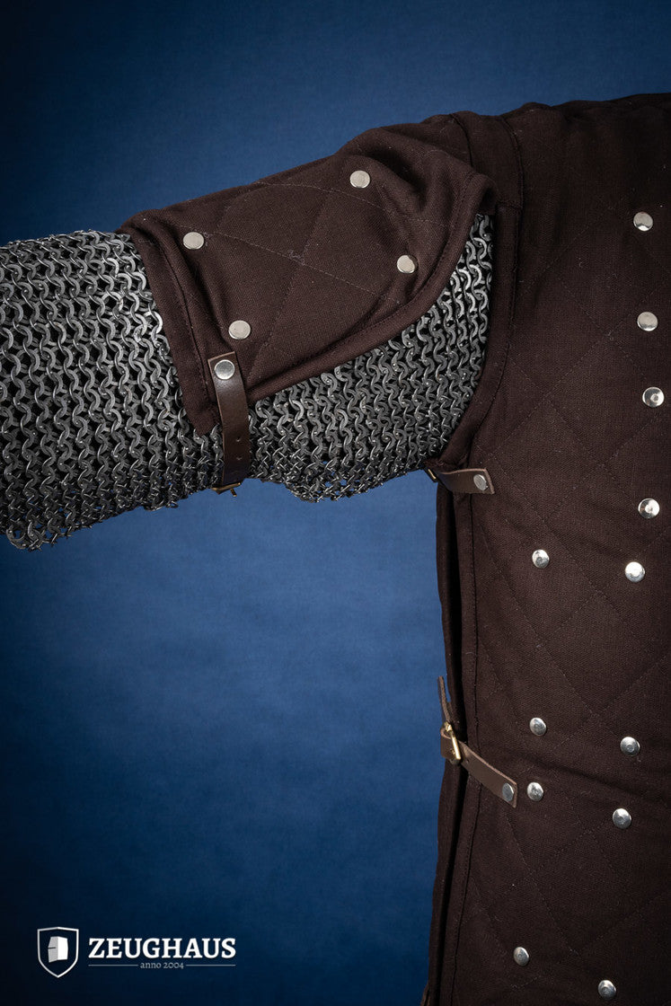 Brown Brigantine armor with studded detailing and leather straps, designed for warriors.