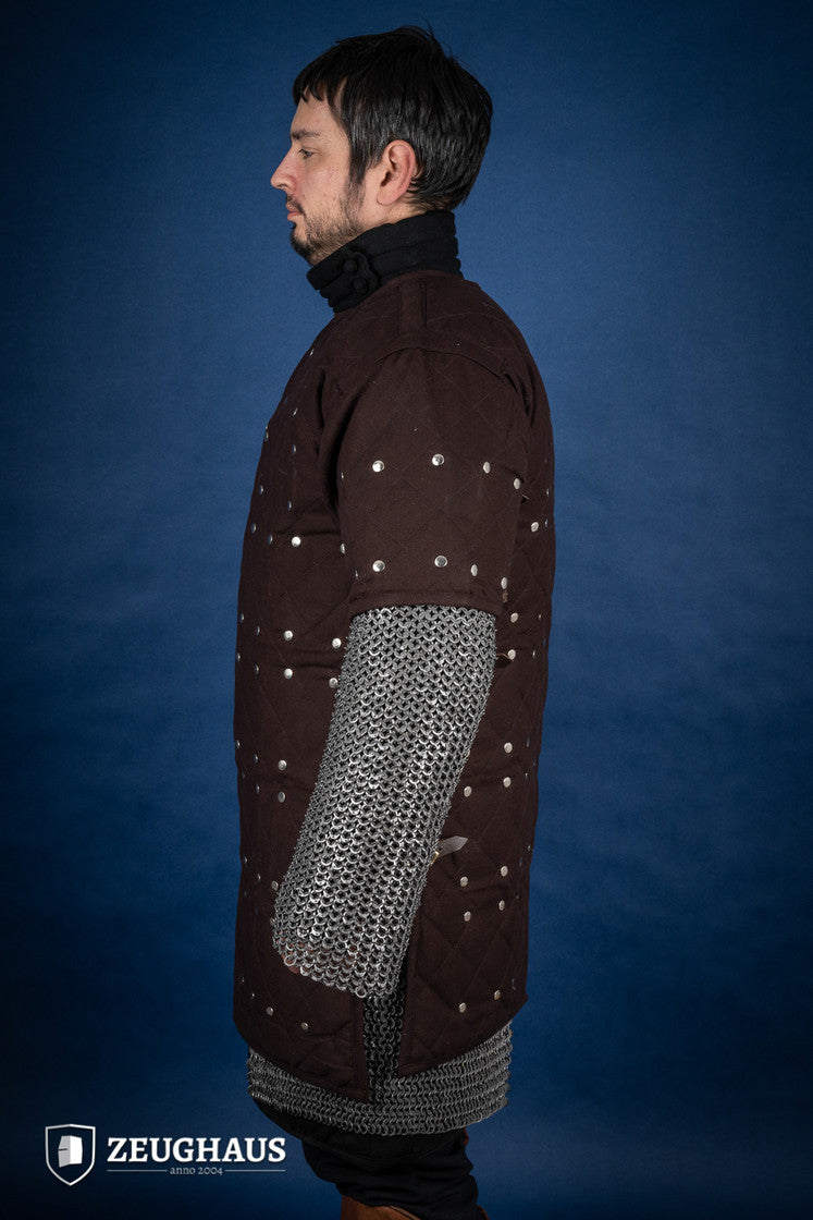 Brown Brigantine armor with studded detailing and leather straps, designed for warriors.