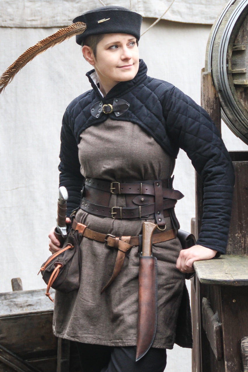 Broad Belt Abies Brown made from vegetable tanned leather, showcasing its elegant brown color and sturdy design.