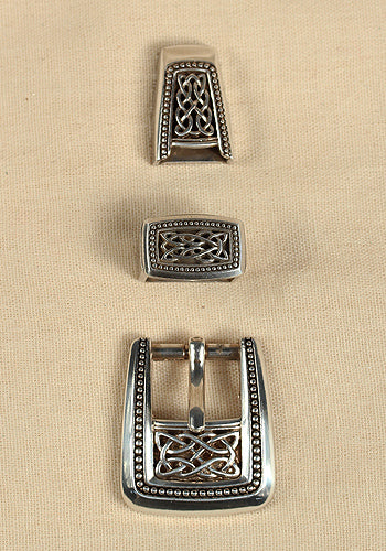 Antique silver buckle set featuring intricate Celtic knot design, perfect for leather belts.