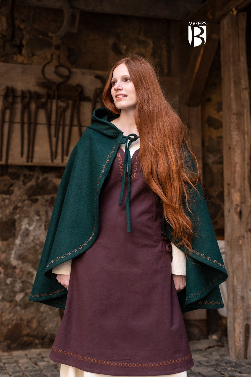 A stylish Cape Affra Green made of wool felt, featuring a long pointed hood and ornamental embroidery, perfect for medieval enthusiasts.