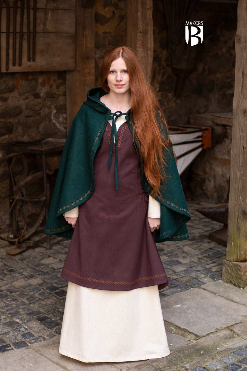 A stylish Cape Affra Green made of wool felt, featuring a long pointed hood and ornamental embroidery, perfect for medieval enthusiasts.