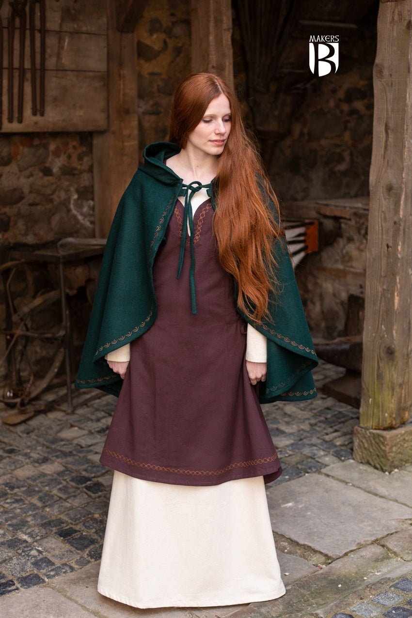 A stylish Cape Affra Green made of wool felt, featuring a long pointed hood and ornamental embroidery, perfect for medieval enthusiasts.