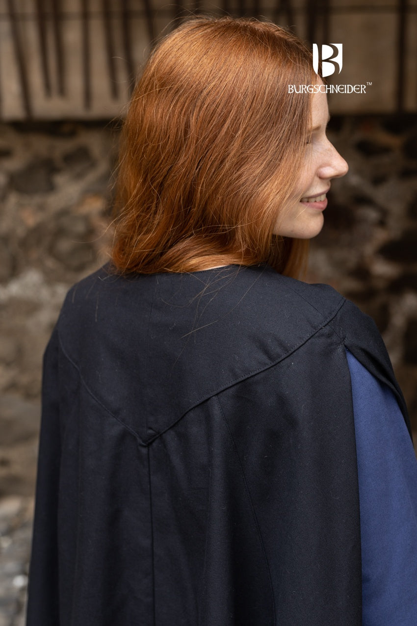 A stylish black cape made of lightweight cotton, featuring cross-over bindings that fasten below the cape, perfect for rogues and rangers.