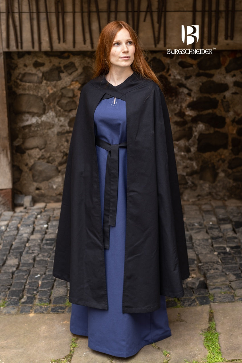 A stylish black cape made of lightweight cotton, featuring cross-over bindings that fasten below the cape, perfect for rogues and rangers.