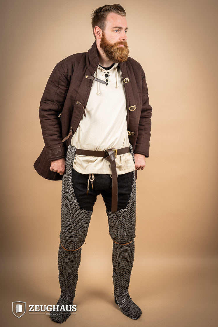 Chainmail Chausses made of oiled mild steel with flat rings, showcasing riveted construction and European 4-in-1 braid type.