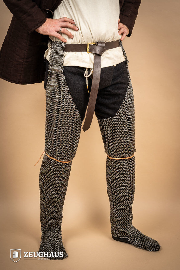Chainmail chausses made of oiled mild steel with 9mm round rings, showcasing European 4-in-1 braid design.