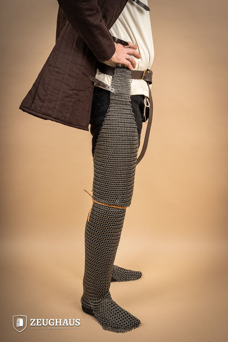 Chainmail chausses made of oiled mild steel with 9mm round rings, showcasing European 4-in-1 braid design.