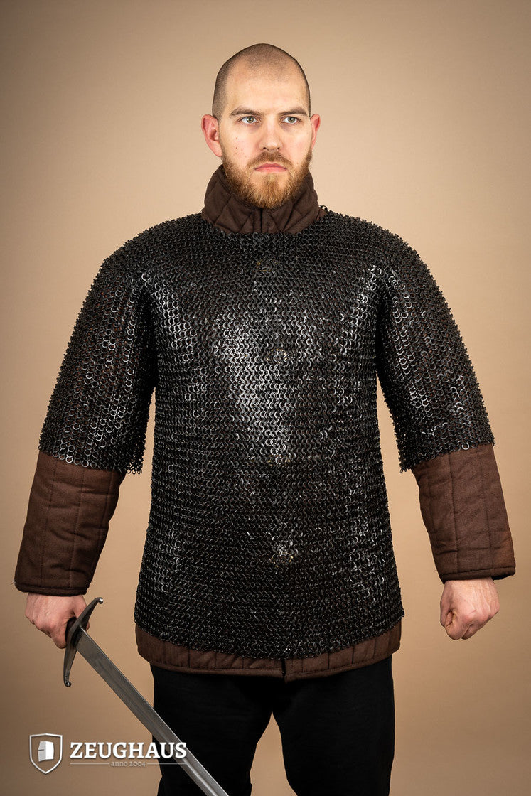 Chainmail Haubergeon made of mild steel with burnished finish, featuring flat rings and riveted design, suitable for reenactments and cosplay.