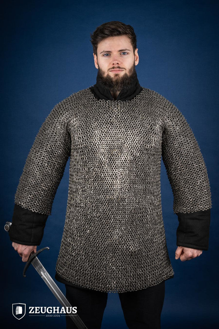 Chainmail Haubergeon made of 9mm stainless steel with flat rings, riveted construction, showcasing its natural oiled finish and European 4-in-1 braid type.