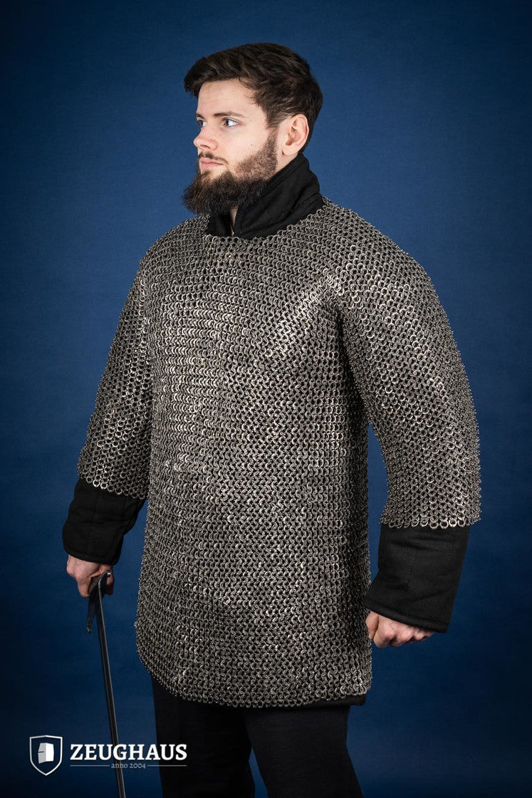Chainmail Haubergeon made of 9mm stainless steel with flat rings, riveted construction, showcasing its natural oiled finish and European 4-in-1 braid type.