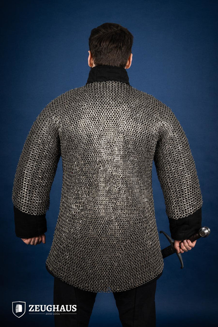 Chainmail Haubergeon made of 9mm stainless steel with flat rings, riveted construction, showcasing its natural oiled finish and European 4-in-1 braid type.