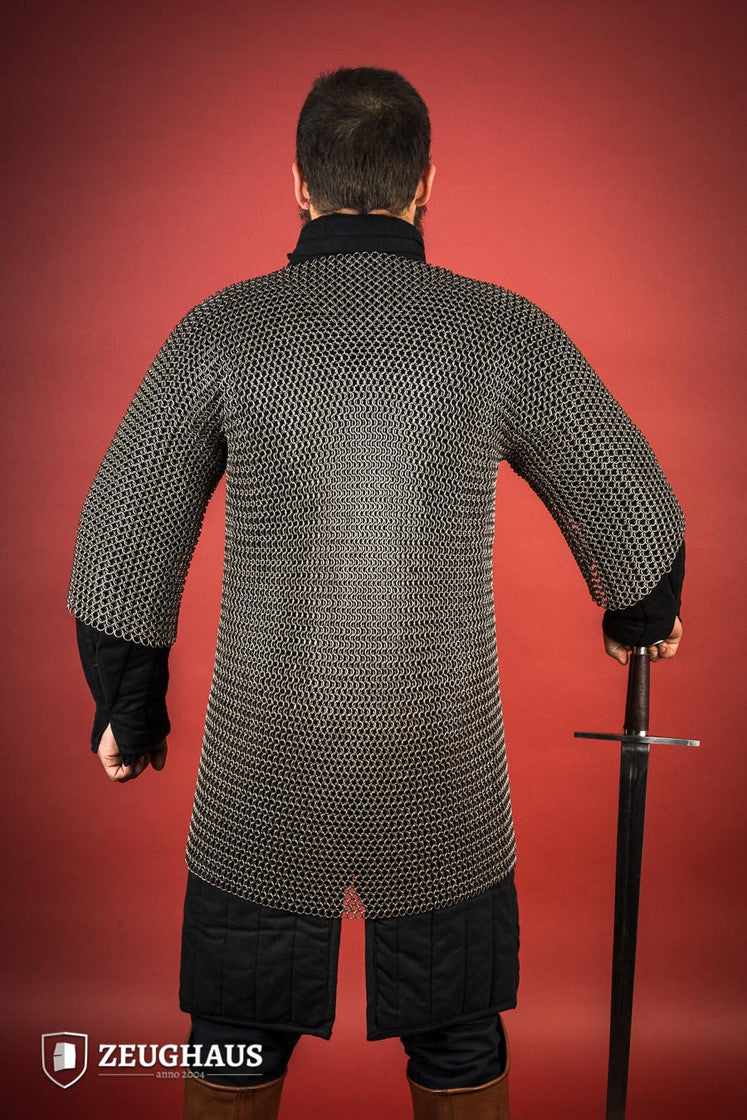 Chainmail Haubergeon made of 9mm steel with an oiled finish, featuring round rings and European 4-in-1 braid type, displayed on a mannequin.