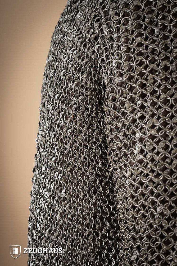 Chainmail Haubergeon made of 10mm oiled mild steel with round riveted rings, showcasing its intricate European 4-in-1 braid pattern.