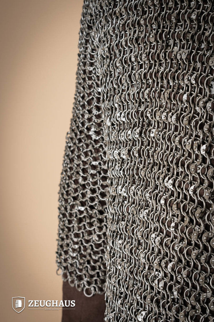 Chainmail Haubergeon made of 10mm oiled mild steel with round riveted rings, showcasing its intricate European 4-in-1 braid pattern.