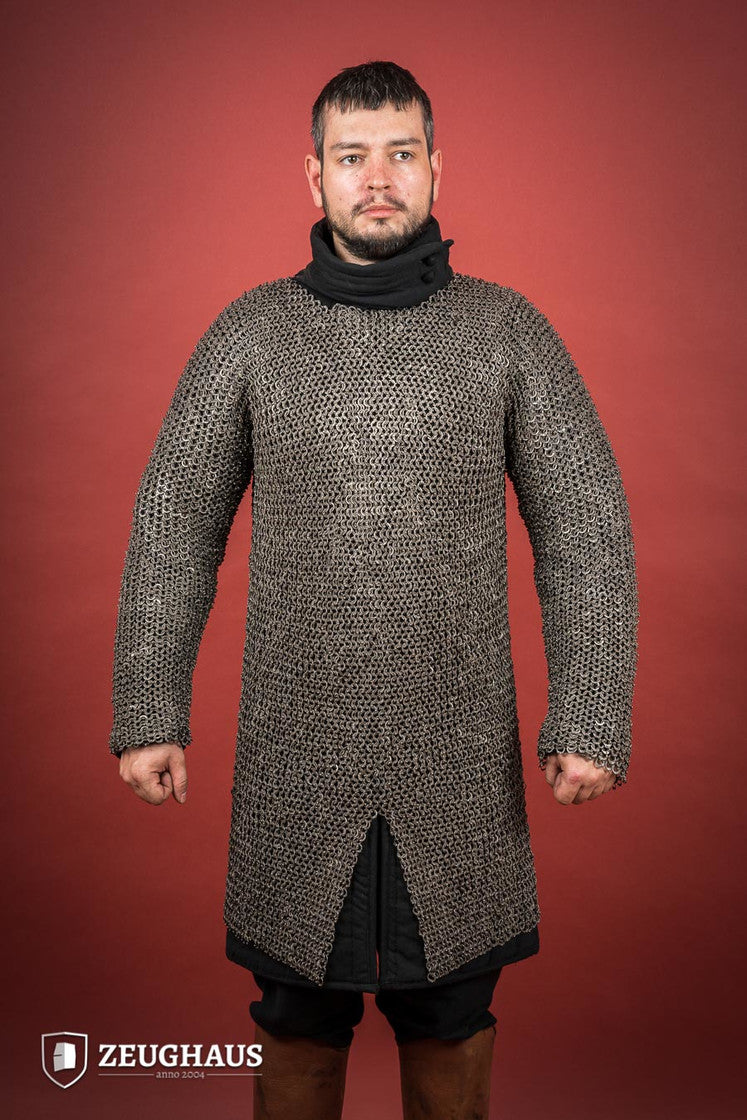 Chainmail Hauberk made of riveted 9mm stainless steel with flat rings, showcasing its natural oiled finish and European 4-in-1 braid type.