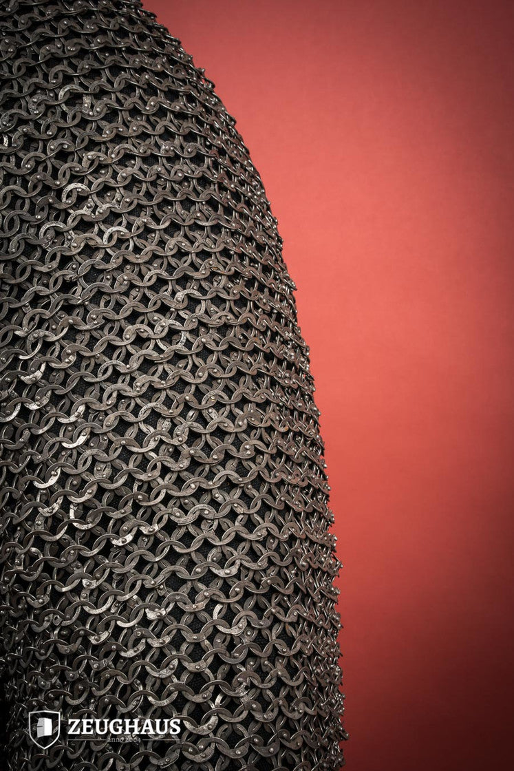 Chainmail Hauberk made of riveted 9mm stainless steel with flat rings, showcasing its natural oiled finish and European 4-in-1 braid type.