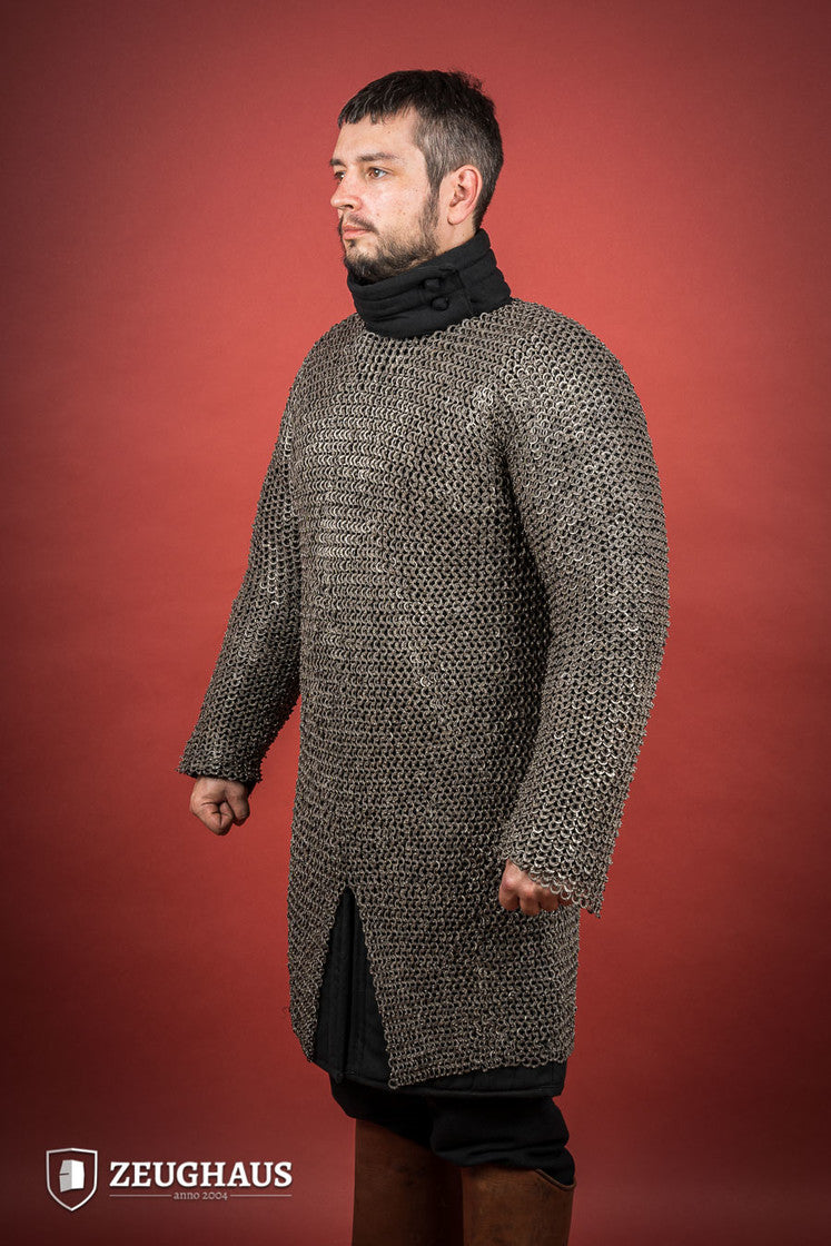 Chainmail Hauberk made of riveted 9mm stainless steel with flat rings, showcasing its natural oiled finish and European 4-in-1 braid type.