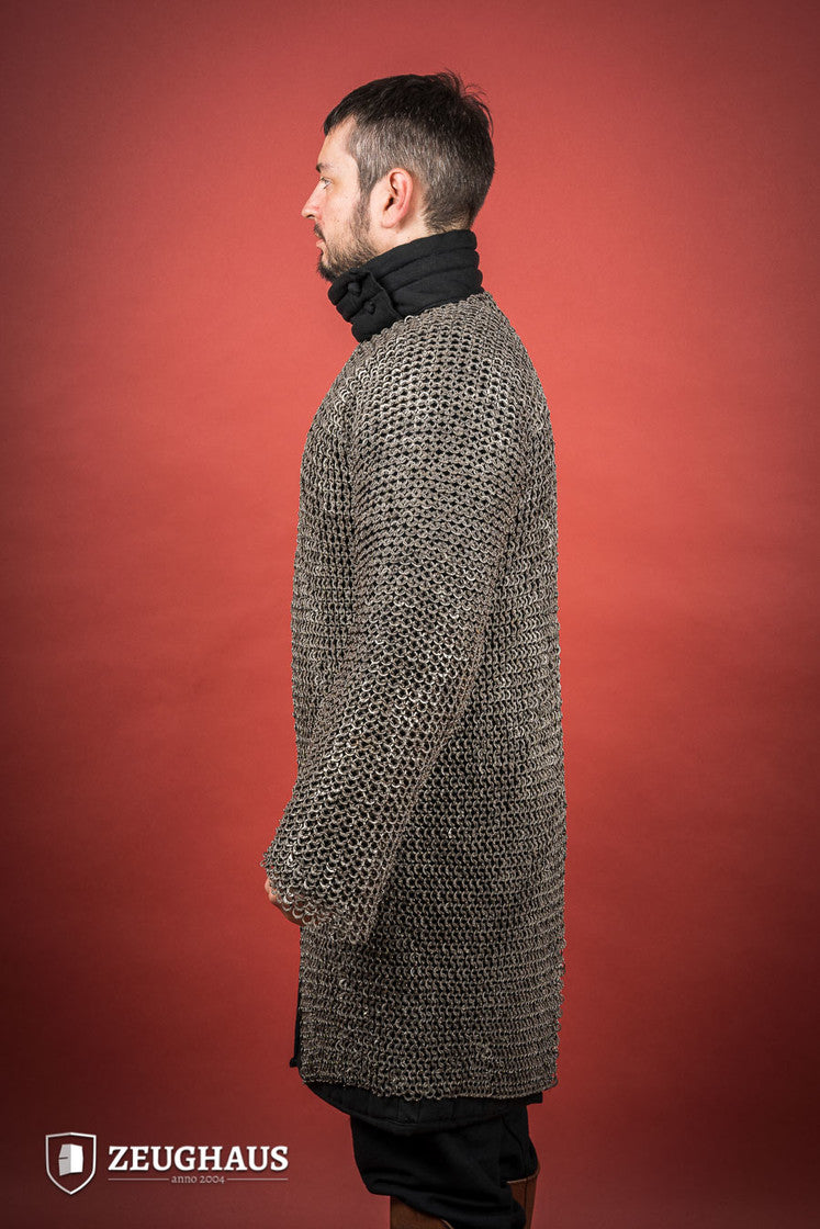 Chainmail Hauberk made of riveted 9mm stainless steel with flat rings, showcasing its natural oiled finish and European 4-in-1 braid type.