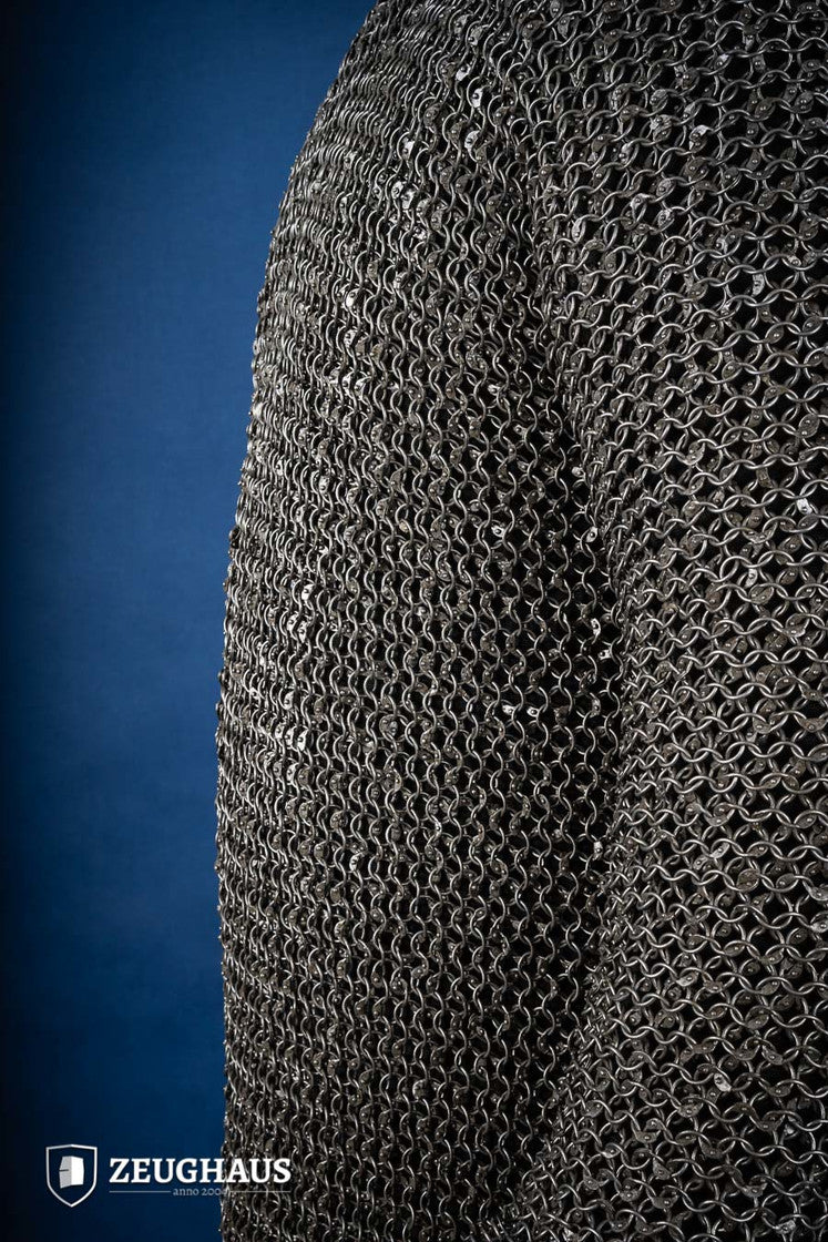 Chainmail Hauberk made of riveted 10mm steel rings, featuring a natural oiled finish, showcasing its intricate European 4-in-1 braid design.