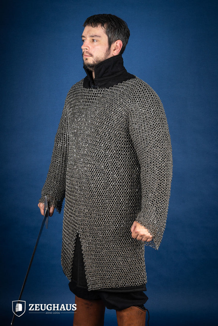 Chainmail Hauberk made of riveted 10mm steel rings, featuring a natural oiled finish, showcasing its intricate European 4-in-1 braid design.