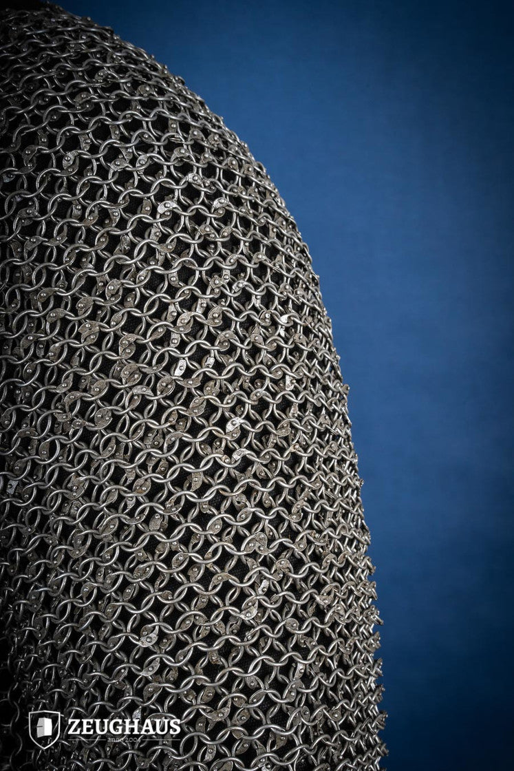Chainmail Hauberk made of riveted 10mm steel rings, featuring a natural oiled finish, showcasing its intricate European 4-in-1 braid design.
