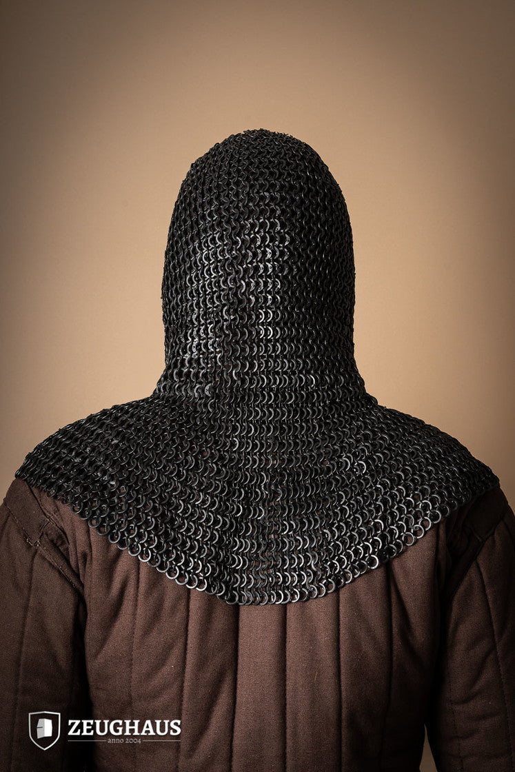 A detailed view of a burnished chainmail hood made from mild steel, featuring flat rings and a unique riveting pattern.