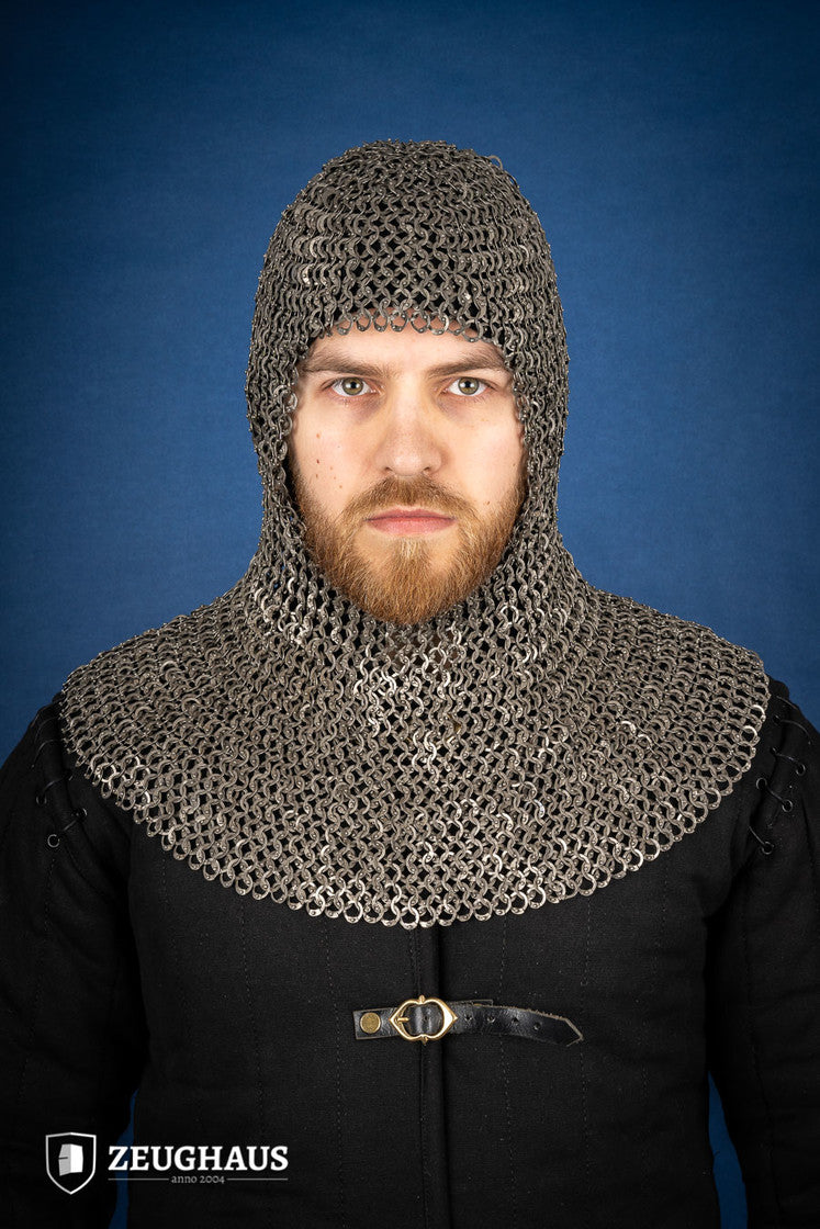 A detailed view of a Chainmail Hood made from 9mm stainless steel with a natural oiled finish, showcasing riveted flat rings in a European 4-in-1 braid pattern.