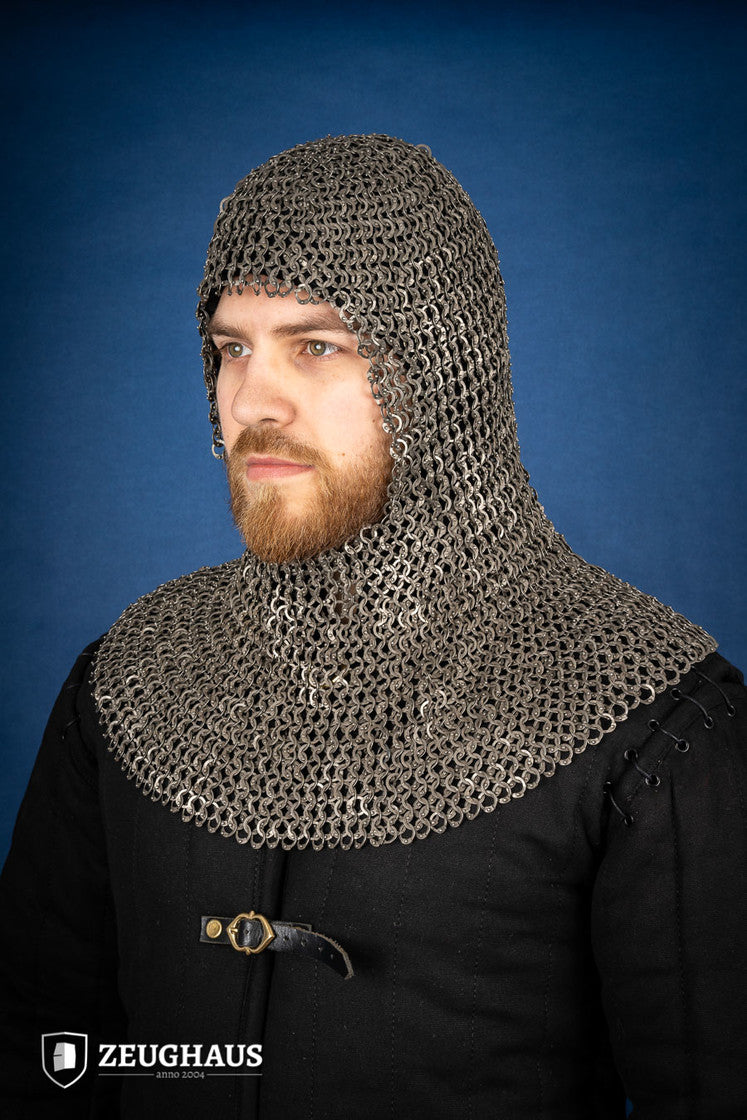 A detailed view of a Chainmail Hood made from 9mm stainless steel with a natural oiled finish, showcasing riveted flat rings in a European 4-in-1 braid pattern.