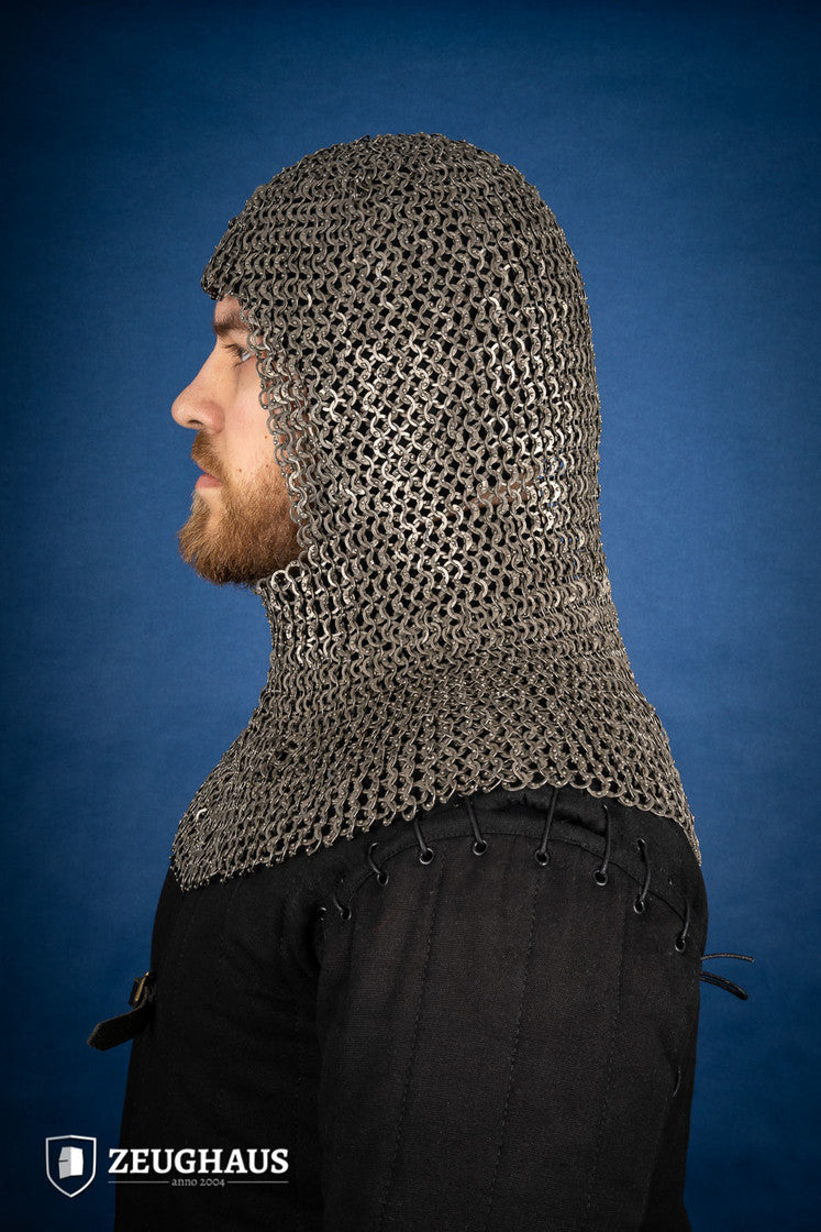 A detailed view of a Chainmail Hood made from 9mm stainless steel with a natural oiled finish, showcasing riveted flat rings in a European 4-in-1 braid pattern.