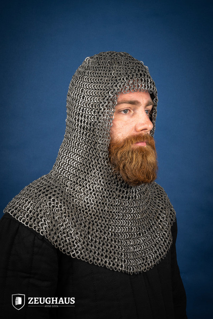 Chainmail hood made of 9mm oiled mild steel with flat rings, featuring wedge riveted construction and European 4-in-1 braid design.