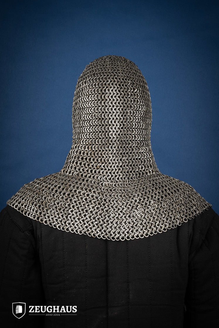 Chainmail hood made of 9mm oiled mild steel with flat rings, featuring wedge riveted construction and European 4-in-1 braid design.