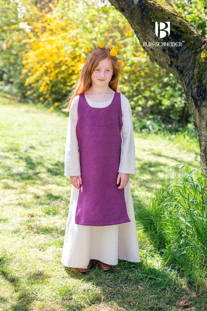 Children's Over Dress Ylva in Lilac, featuring adjustable fabric ties and durable cotton fabric, perfect for active play.