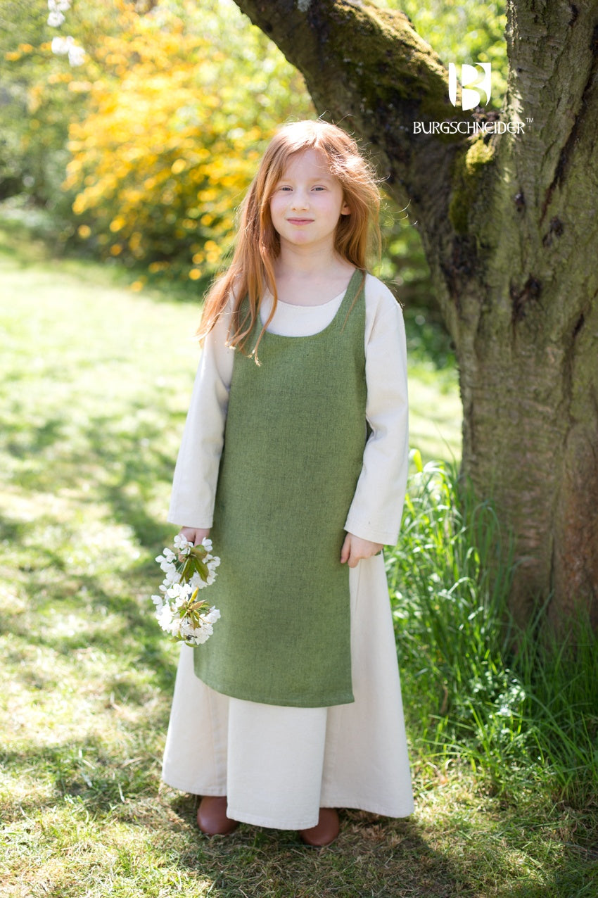 Children's Over Dress Ylva in Linden Green, featuring fabric ties and durable cotton material, perfect for active kids.