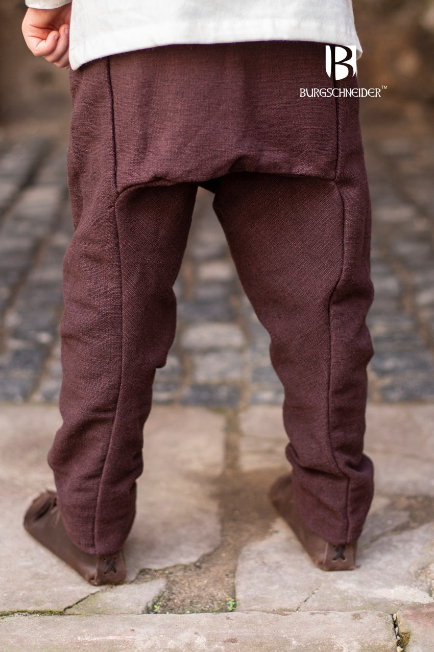 Children's Thorsberg Pants Ragnarsson in brown, made of 100% cotton, showcasing flexible design and historical style.