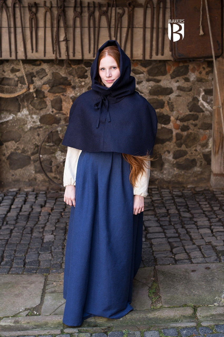 Cowl Curt Dark Blue gugel, featuring a snug fit over shoulders, adjustable neck straps, and a roll-out headpiece for cold weather protection.