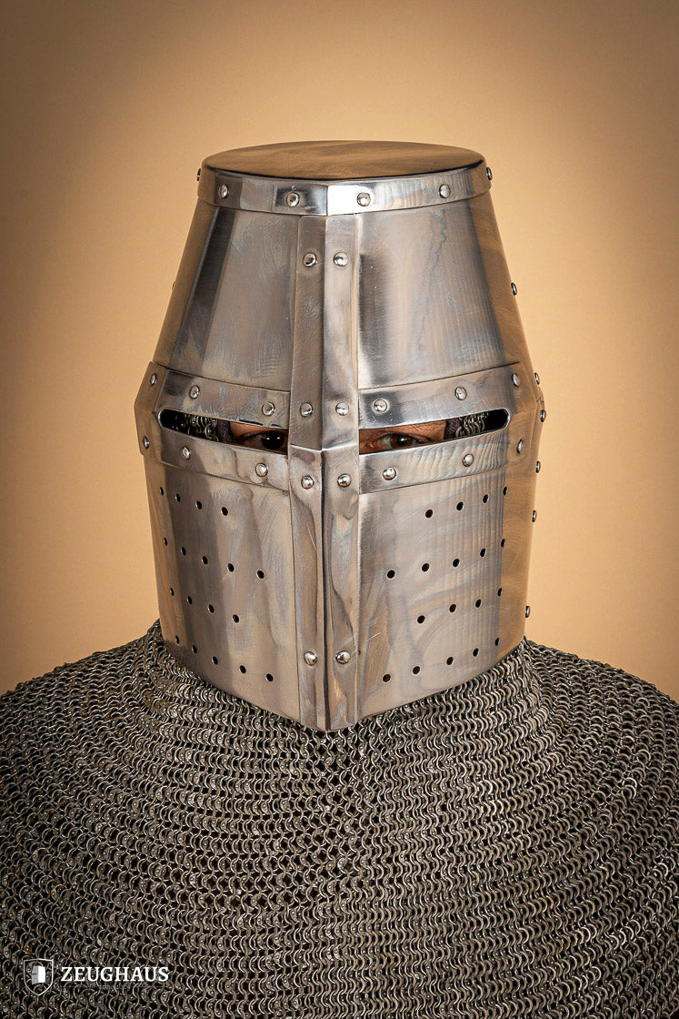 Crusader Great Helmet made of 1.6mm polished steel with a fixed visor and leather chin strap, showcasing medieval craftsmanship.