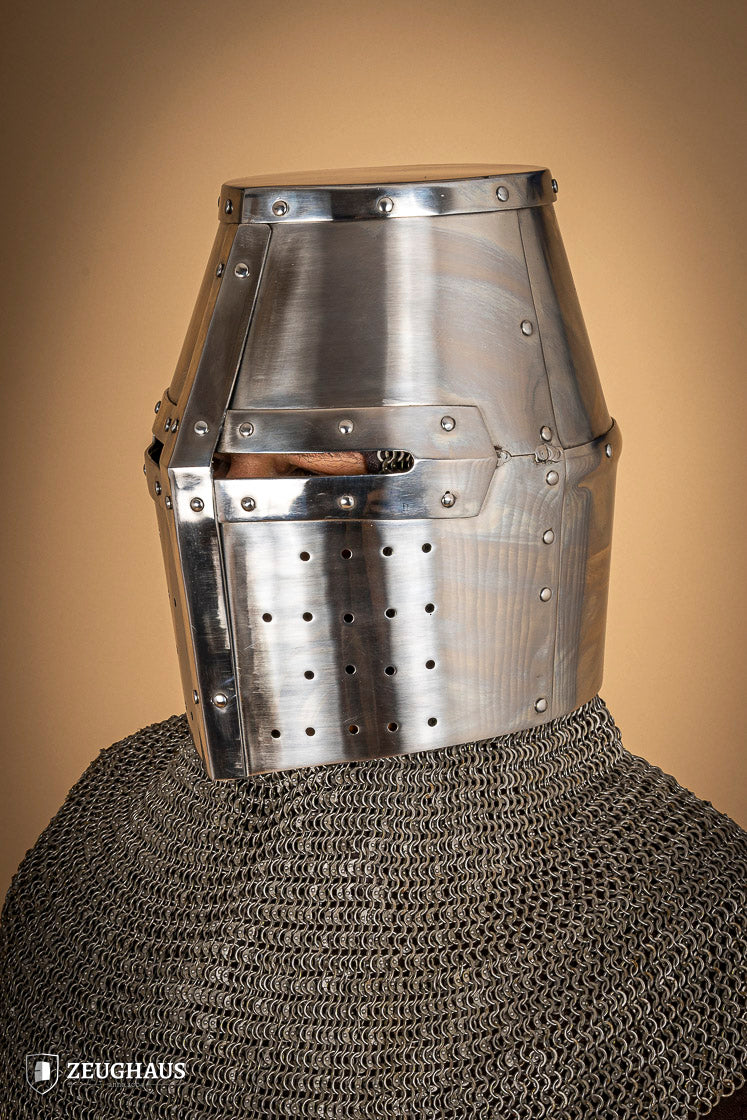 Crusader Great Helmet made of 1.6mm polished steel with a fixed visor and leather chin strap, showcasing medieval craftsmanship.