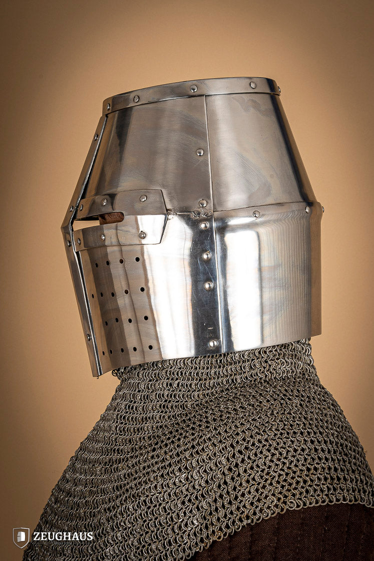 Crusader Great Helmet made of 1.6mm polished steel with a fixed visor and leather chin strap, showcasing medieval craftsmanship.