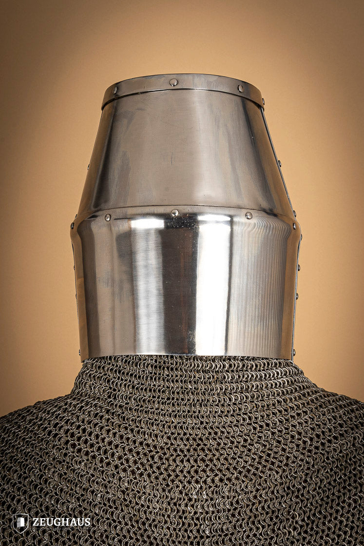 Crusader Great Helmet made of 1.6mm polished steel with a fixed visor and leather chin strap, showcasing medieval craftsmanship.