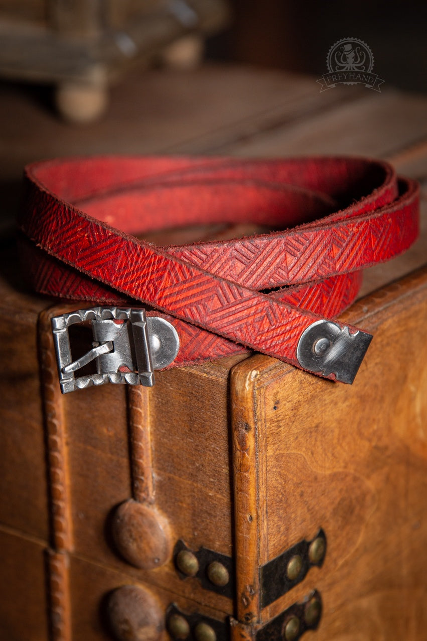Erwin Red Decorated Belt featuring intricate leatherwork and a silver-colored buckle, ideal for LARP and festivals.