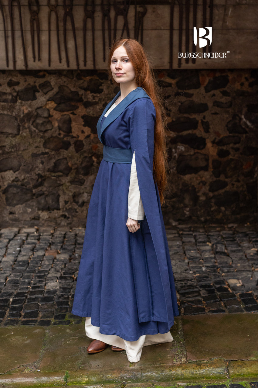 Elegant Agnes Dress in Dark Blue/Woad Blue with flared gown design and long slit sleeves.