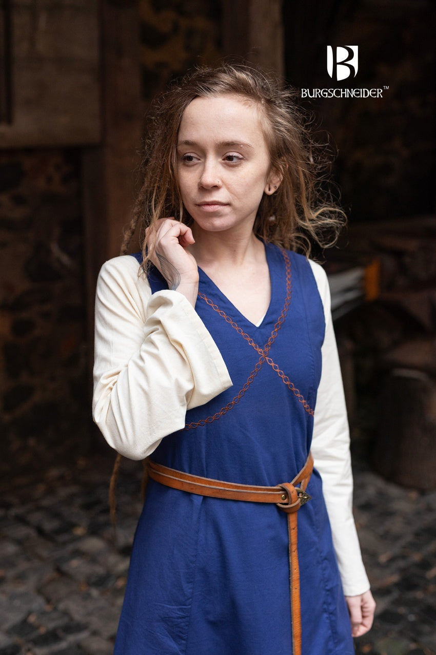 Khara Blue Dress featuring a sleeveless design, V-neckline with embroidery, and adjustable lacing at the back, made from fine cotton.