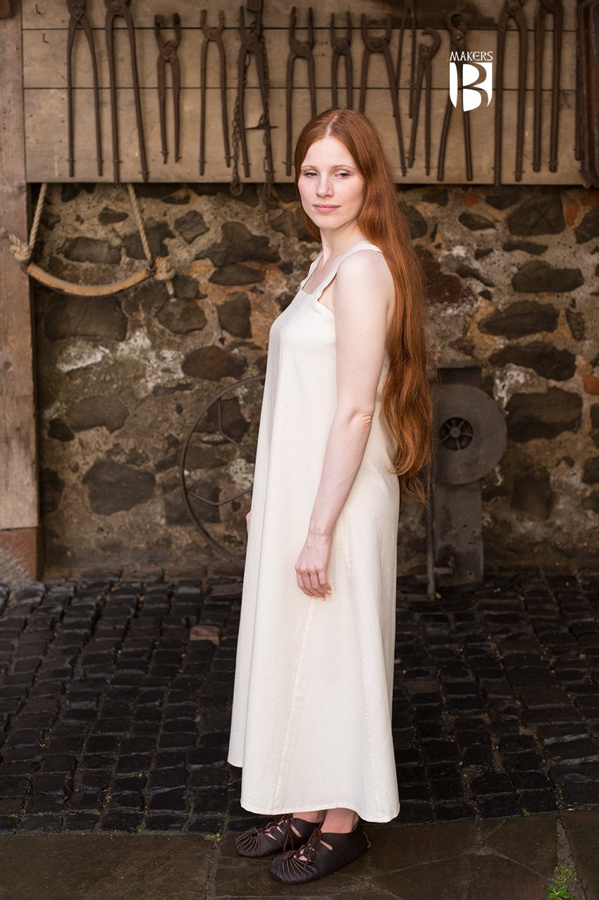 Metta Natural Dress featuring an A-shape cut, ¾ length sleeves, and a pretty neckline, perfect for hot tub relaxation.