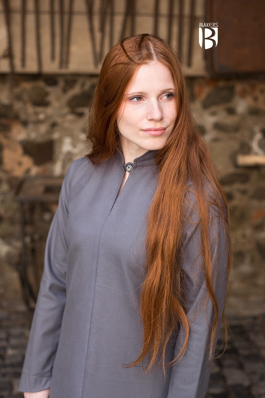 A stylish grey dress with long sleeves and a high collar, showcasing its elegant design and soft cotton fabric.