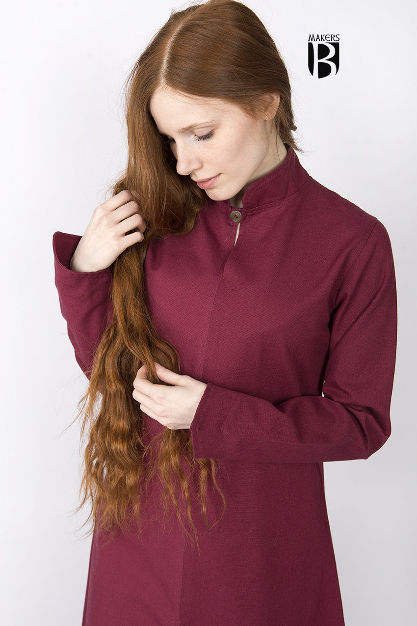 A medieval robe in rich red color featuring a tall stand-up collar and button fastening, designed for elegance and versatility.