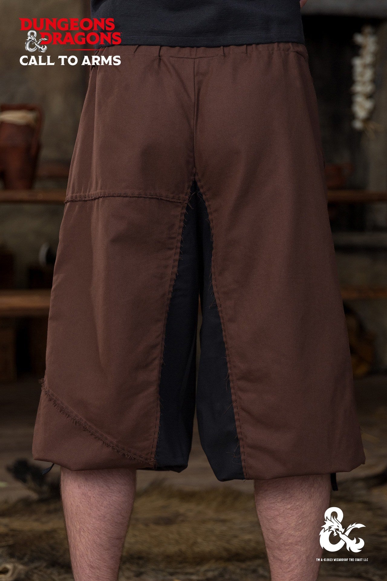 Dungeons & Dragons Barbarian Trousers in brown and black with elastic waistband and lacing at cuffs, showcasing a rugged warrior style.