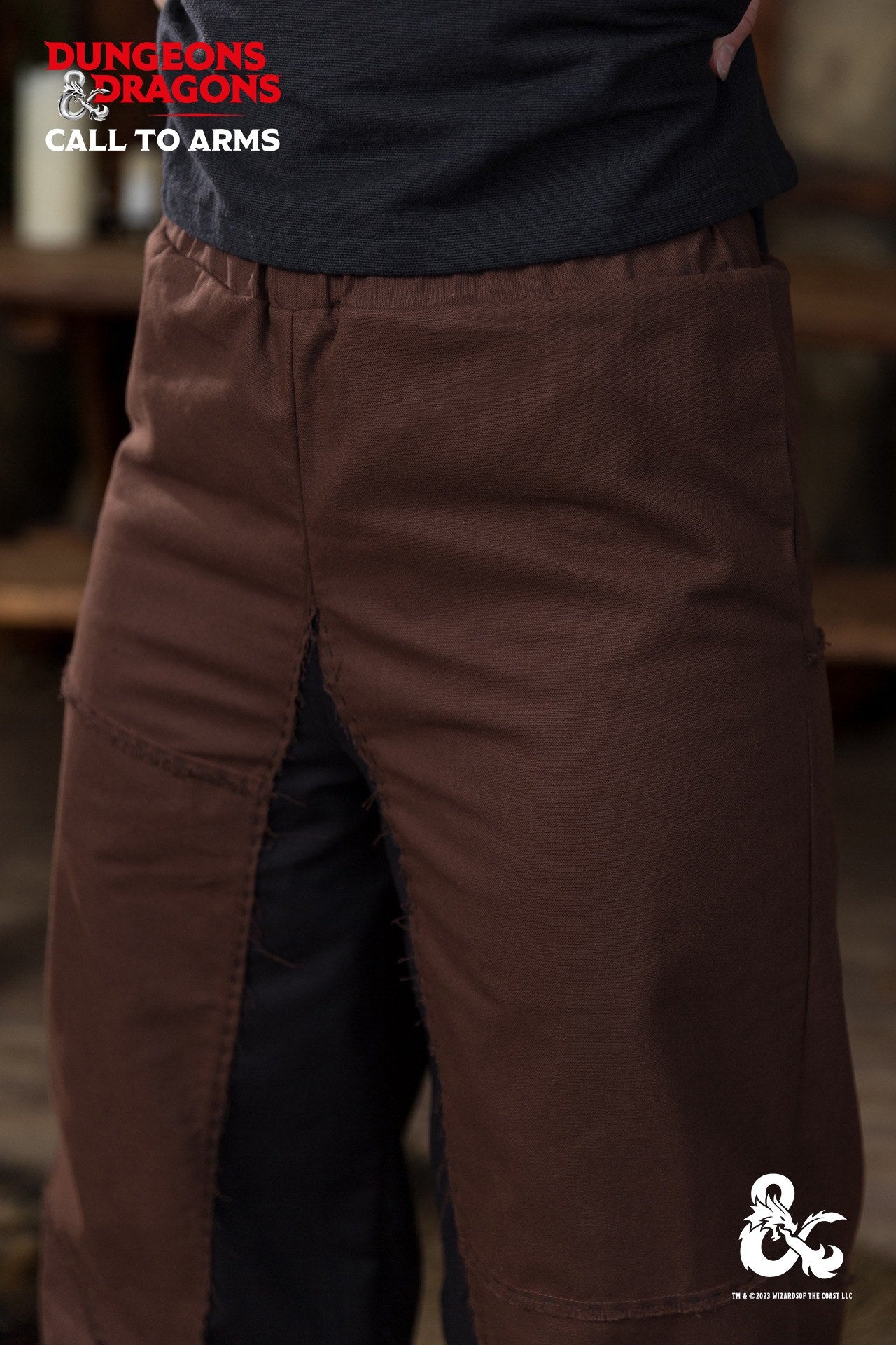 Dungeons & Dragons Barbarian Trousers in brown and black with elastic waistband and lacing at cuffs, showcasing a rugged warrior style.