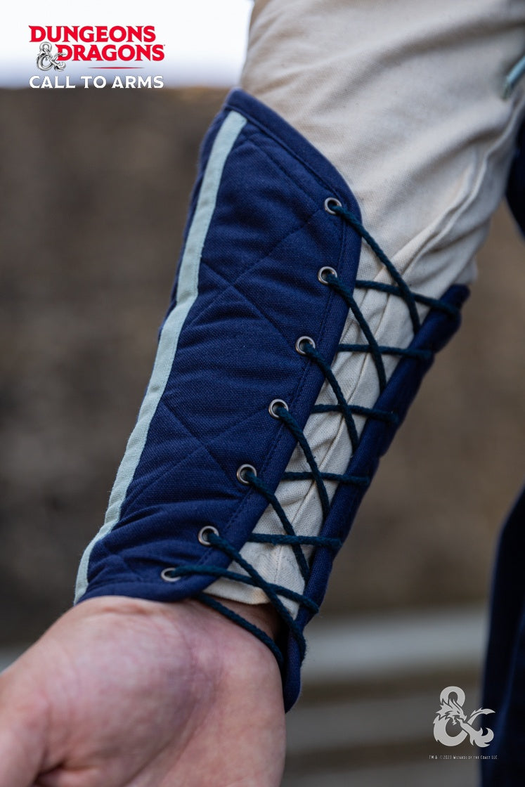 Dungeons & Dragons Cleric Bracers in blue and ice blue with contrast stripes, quilted design, and internal lacing for secure fit.